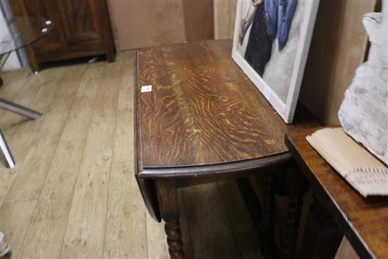 A 1920s oak barley twist gateleg table W.91cm